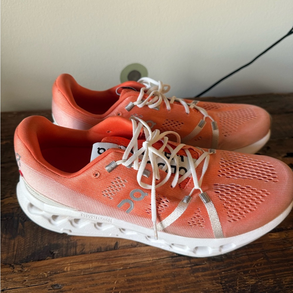 On Running Women's Athletic Shoes in Coral and White